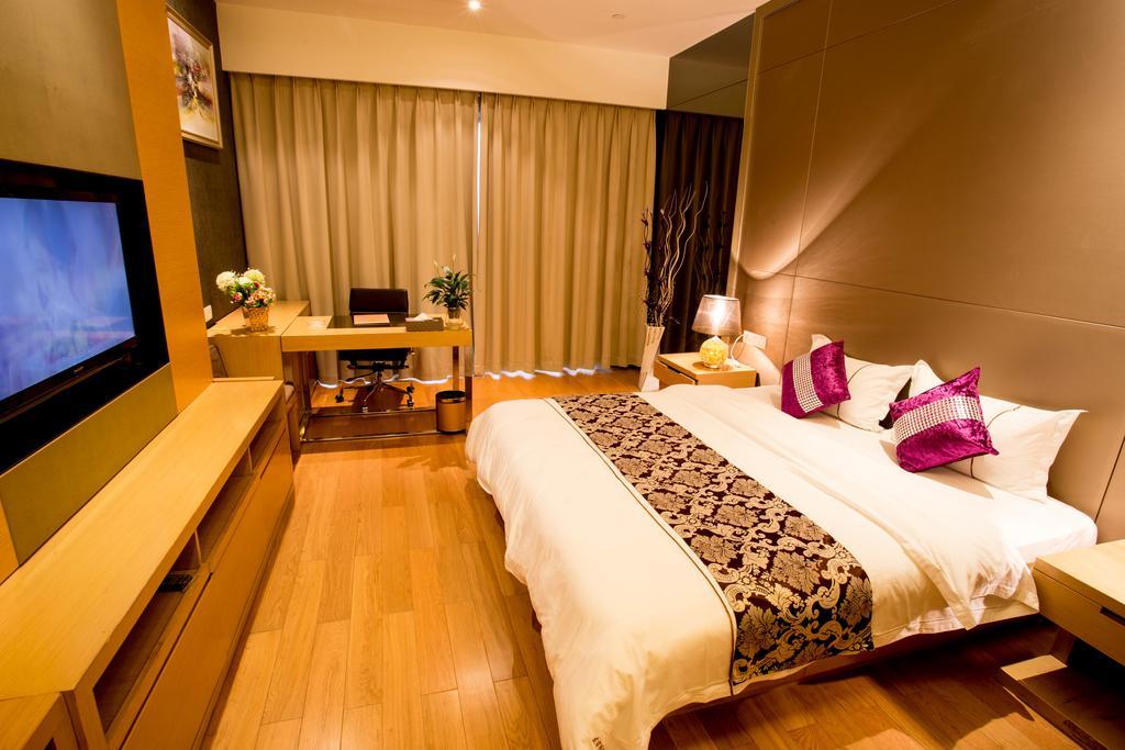 Jufeng Executive Apartment Kanton Zimmer foto