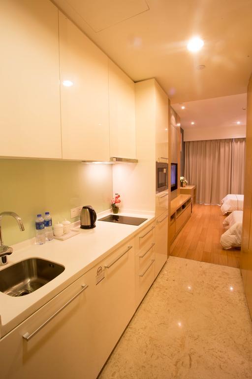 Jufeng Executive Apartment Kanton Zimmer foto