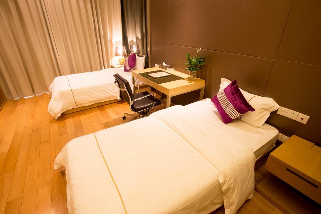 Jufeng Executive Apartment Kanton Zimmer foto