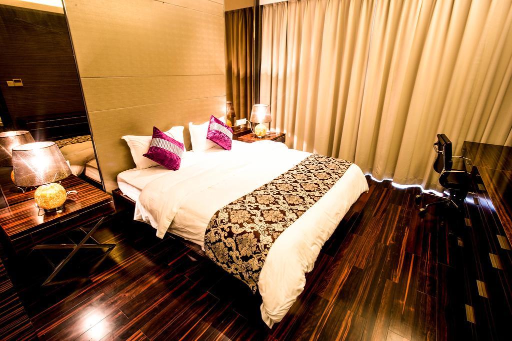 Jufeng Executive Apartment Kanton Zimmer foto