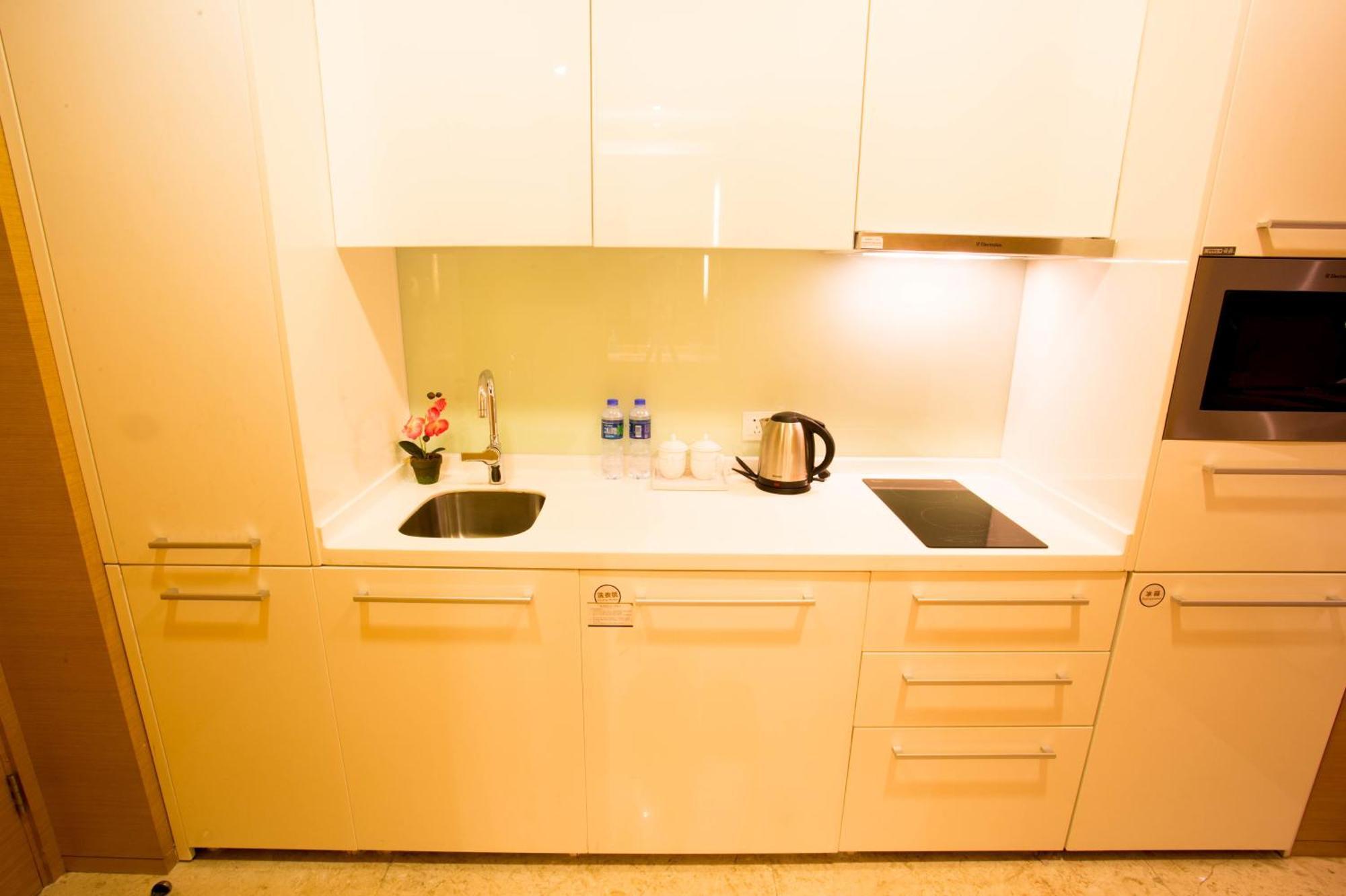 Jufeng Executive Apartment Kanton Zimmer foto